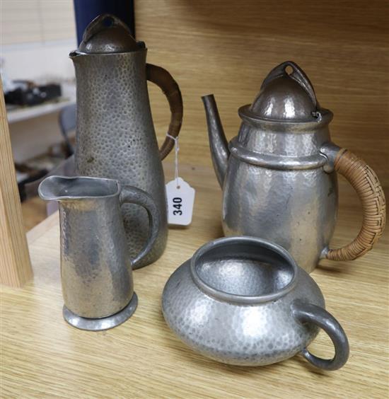 A Liberty Tudric pewter four piece tea set, no.0232